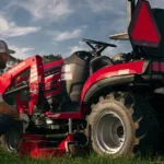 Mahindra Sub-Compact 1100 Series Tractor in field.