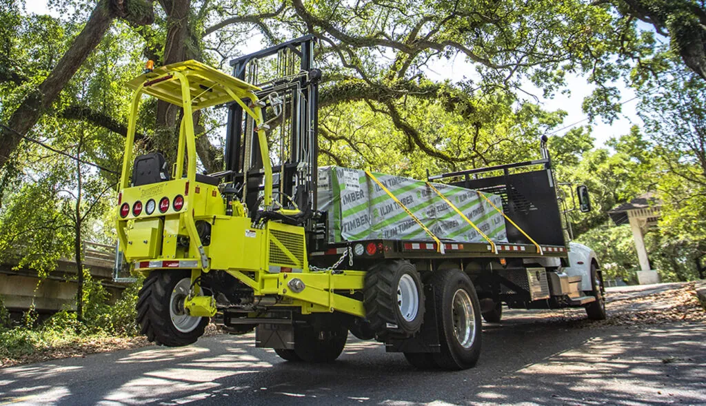 Donkey Forklift mounted to the back of a lumber truck.