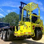 Donkey The Jack forklift mounted on the back of a truck.
