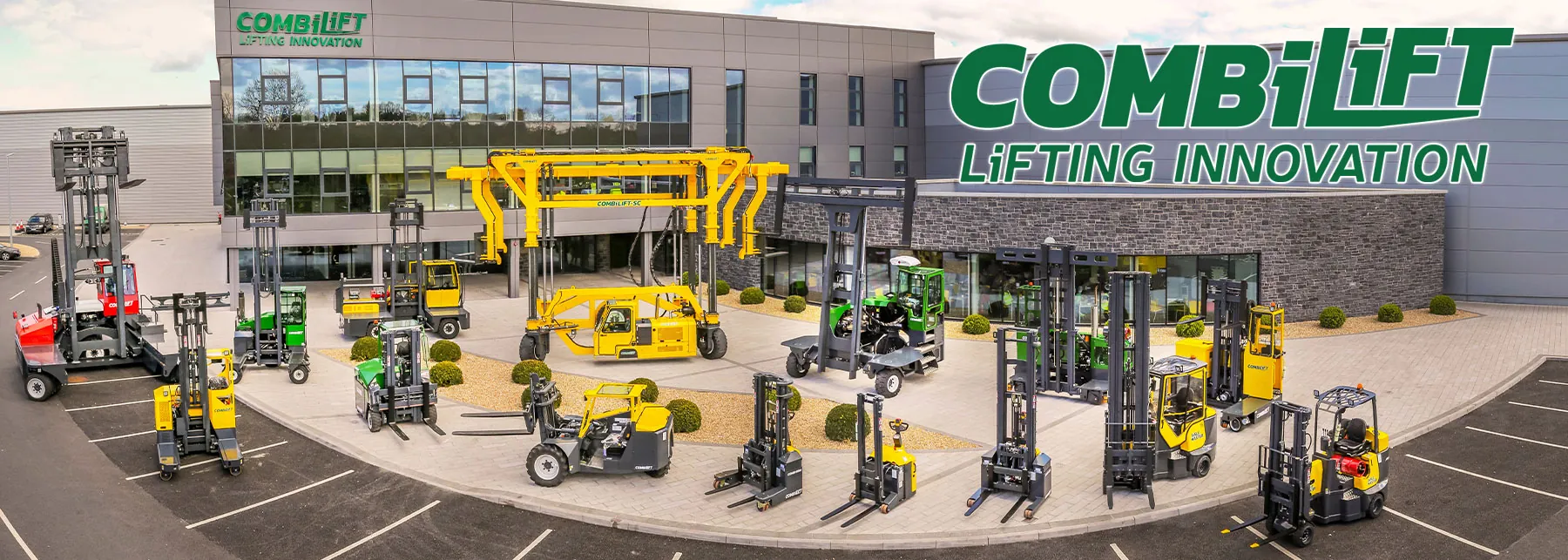 Combilift equipment range lined up outside Combilift building.