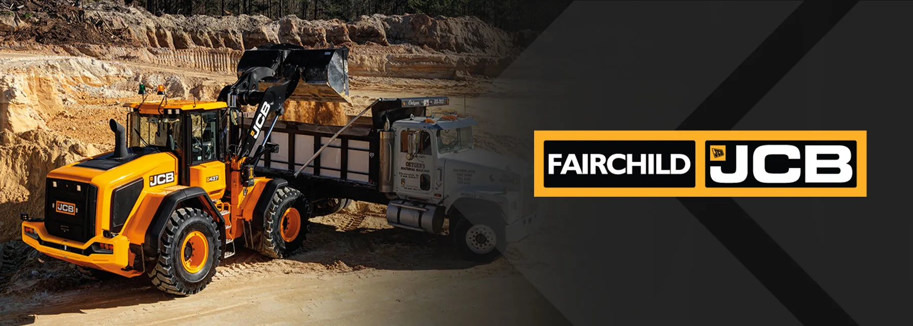 JCB Wheel Loader dumping bucket into dumptruck.