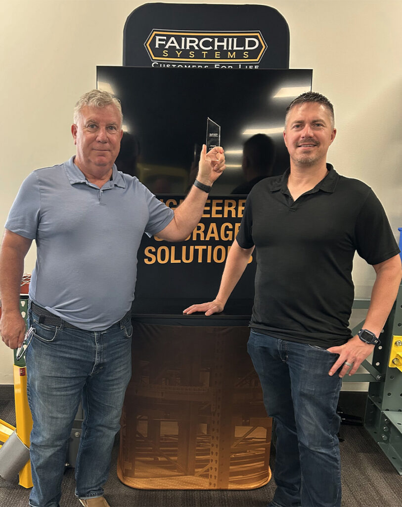 Mike Bruno and Broc Riedner holding 2024 Great 8 Award.