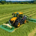 JCB 4220 Fastrac Icon agricultural tractor with multiple attached implements.