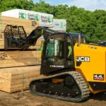 JCB 4TS-8T Teleskid lifting lumber.
