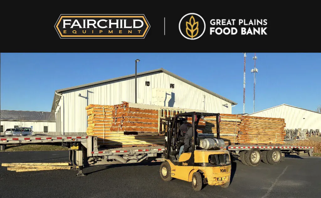 Fairchild Equipment employee lifting freezer parts onto trailer with Yale forklift.