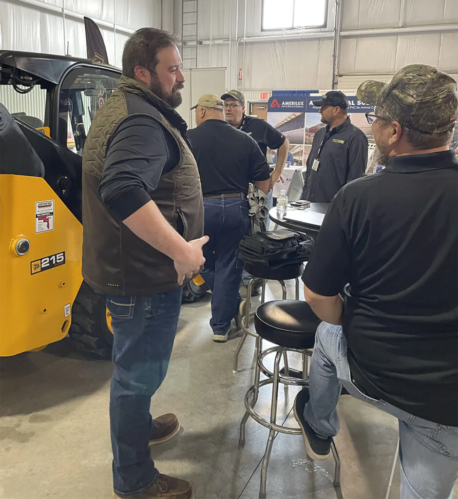 Fairchild JCB team members at Fairchild Equipment's booth at the 2026 WPS Farm Show.