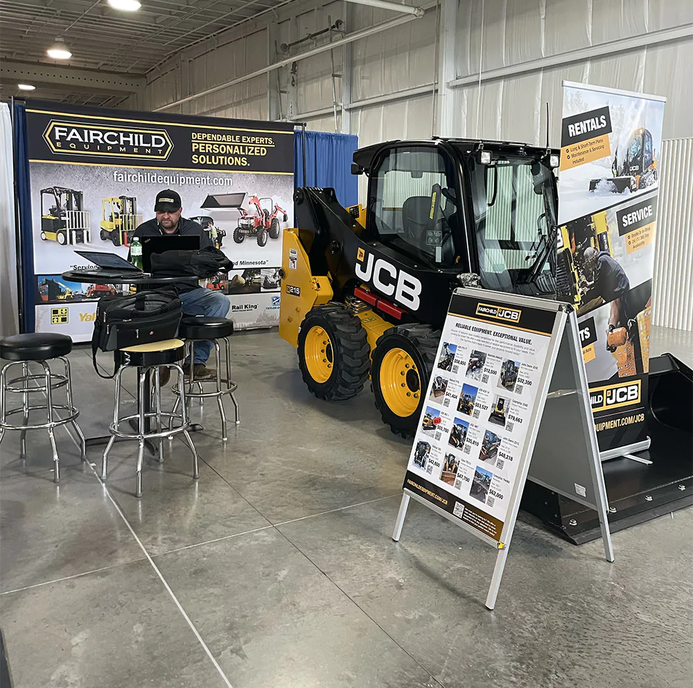 Fairchild Equipment's booth and the JCB Teleskid at the 2026 WPS Farm Show.