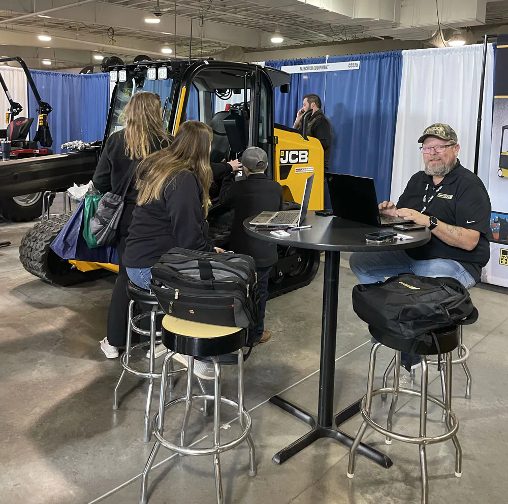 Mike Simonson and attendees at Fairchild's 2026 WPS Farm Show booth.